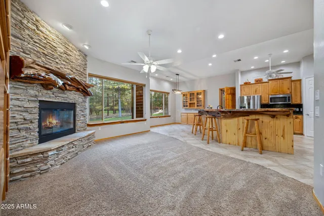 a bathroom with a shower and a glass door