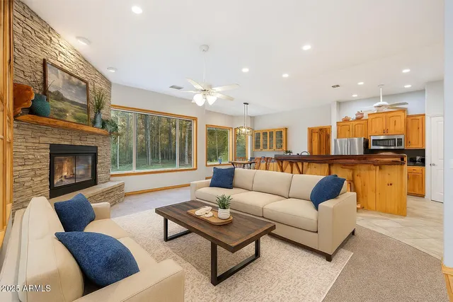 a spacious bedroom with a bed and window