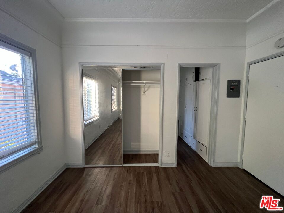 1217 Cedar Avenue Long Beach, CA 90813 - Photo 10 of 15 wooden floor in an empty room with a window