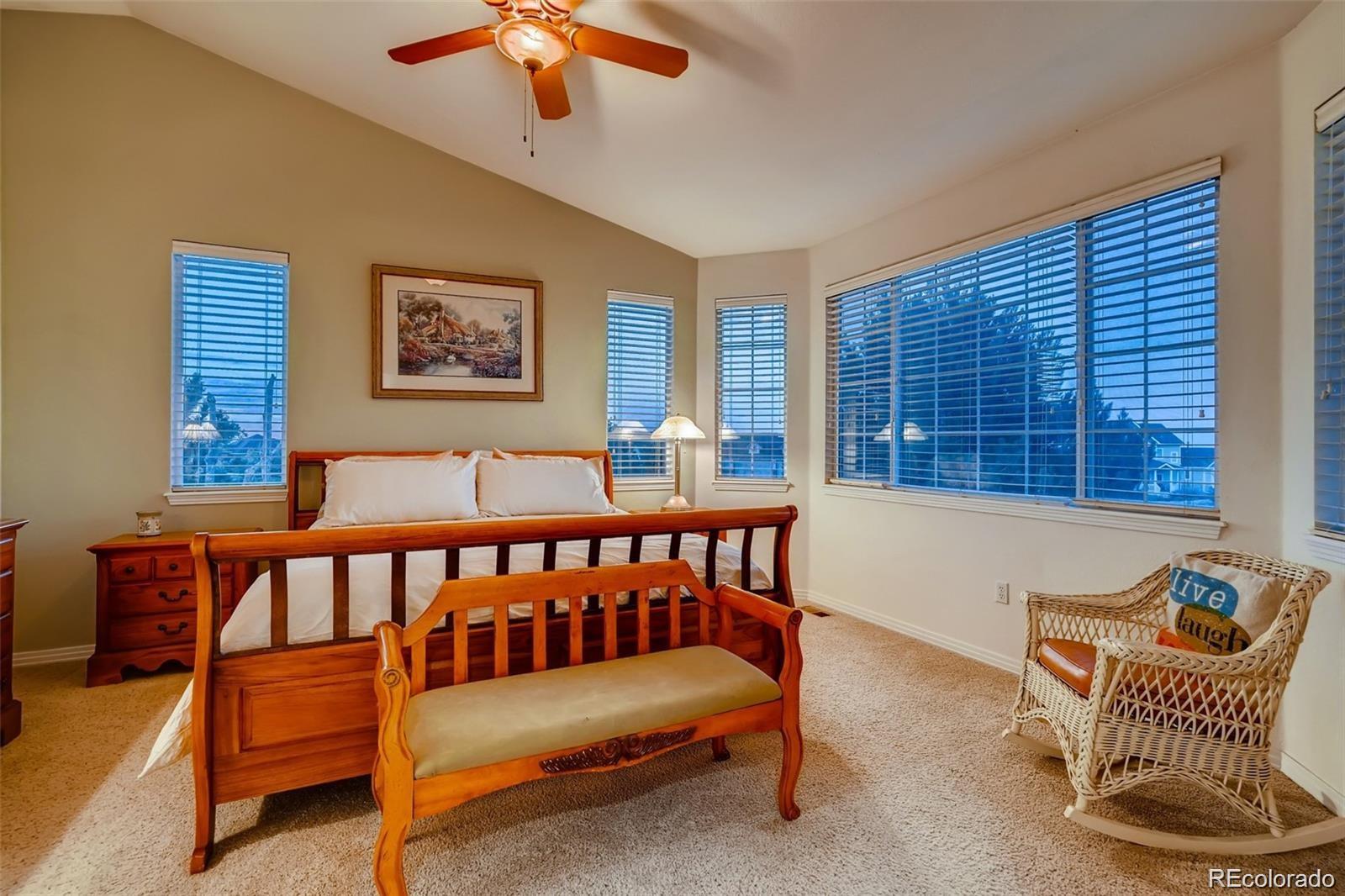 935 Green Gables Circle Bennett, CO 80102 - Photo 21 of 34 a bedroom with furniture and windows