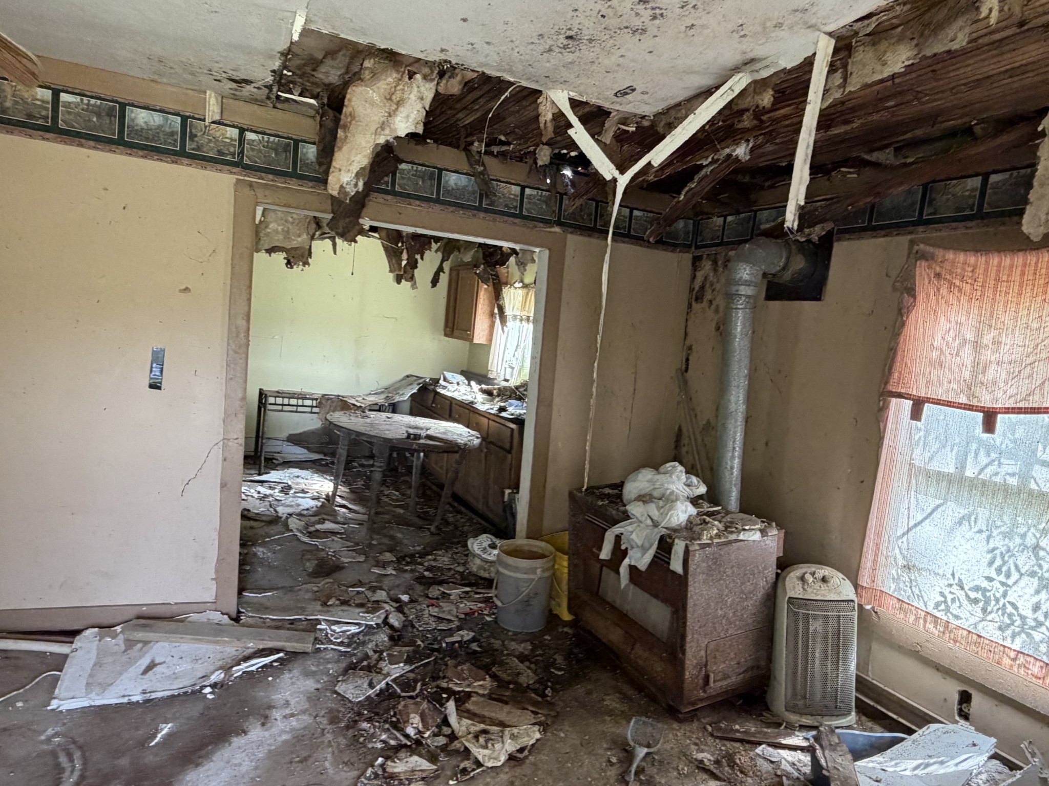 417 Trace Creek Road Hohenwald, TN 38462 - Photo 21 of 34 a room with storage and utility