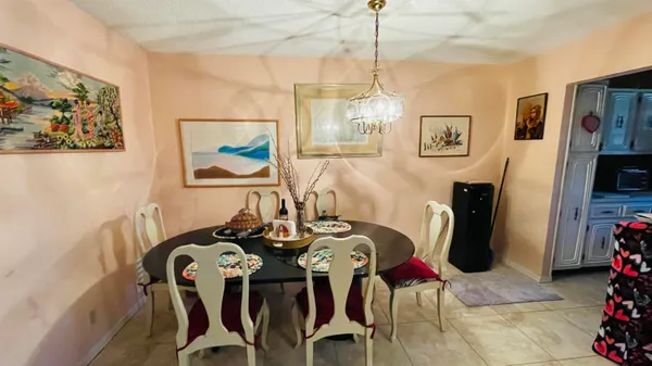 a view of a dining room with furniture