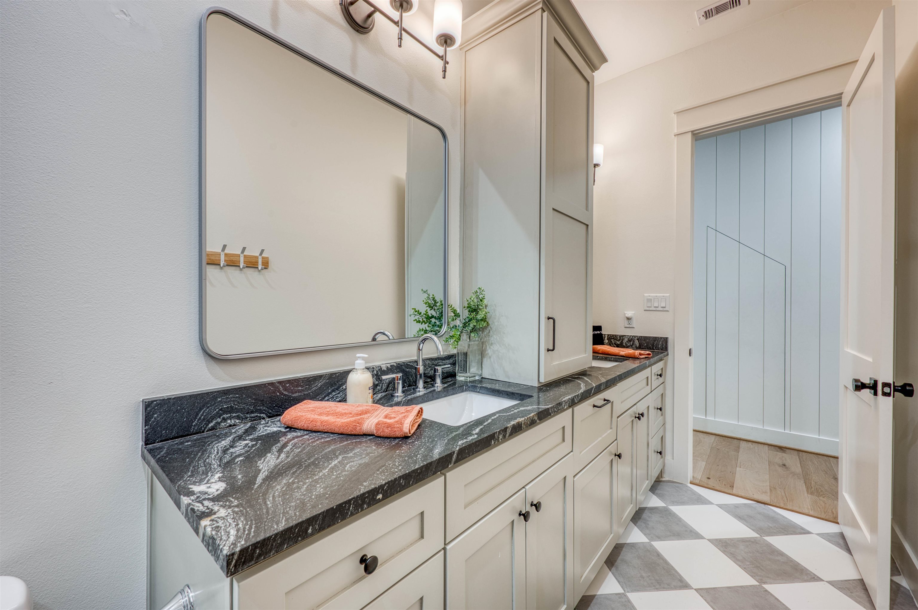 2001 Granite Cove Road Kingsland, TX 78639 - Photo 18 of 42 a bathroom with a double vanity sink and a mirror