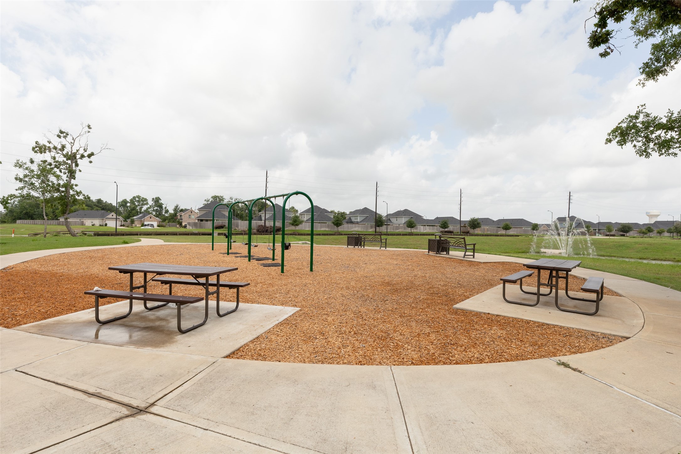 31322 Conover Drive Fulshear, TX 77441 - Photo 30 of 38 a view of a lake with tables and chairs