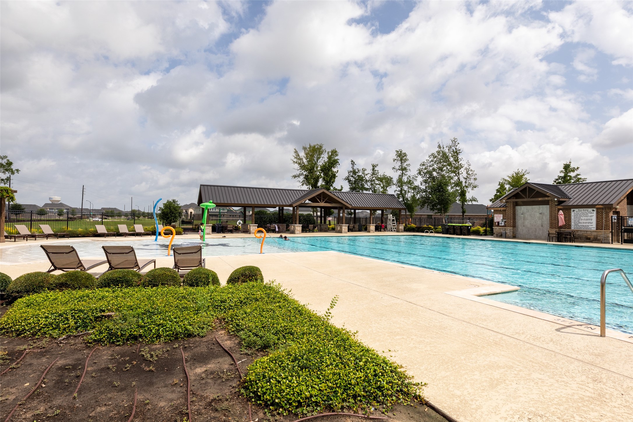 31322 Conover Drive Fulshear, TX 77441 - Photo 37 of 38 a view of a fountain in front of a house with a big yard