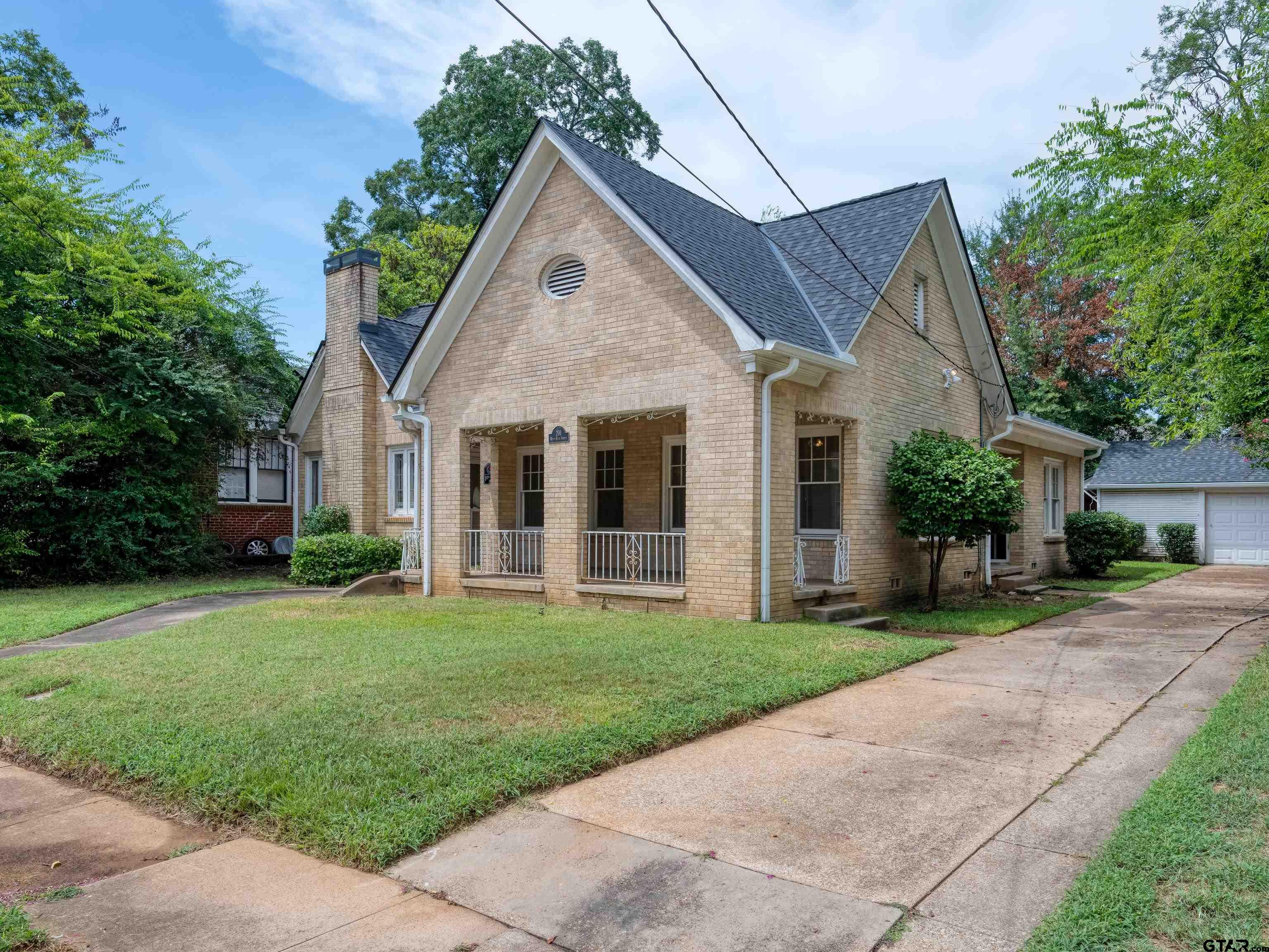201 West Rusk Street Tyler, TX 75701 - Photo 2 of 30 a view of a yard in front of house