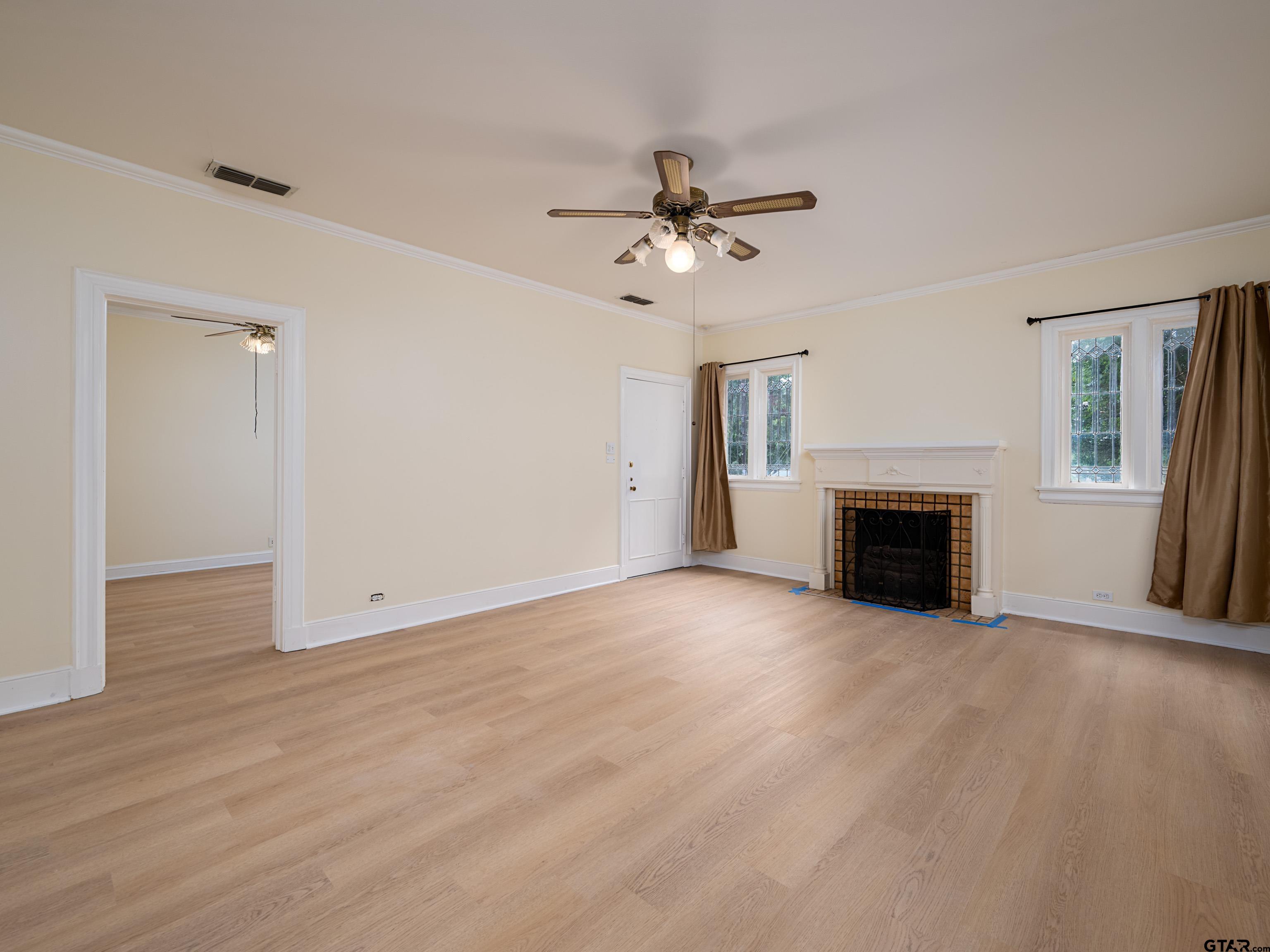 201 West Rusk Street Tyler, TX 75701 - Photo 10 of 30 a view of empty room with fireplace