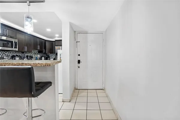 a bathroom with a shower a toilet and a shower