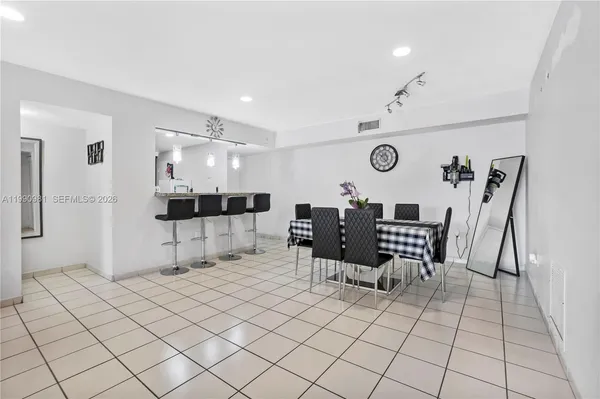 a view of kitchen with furniture and window
