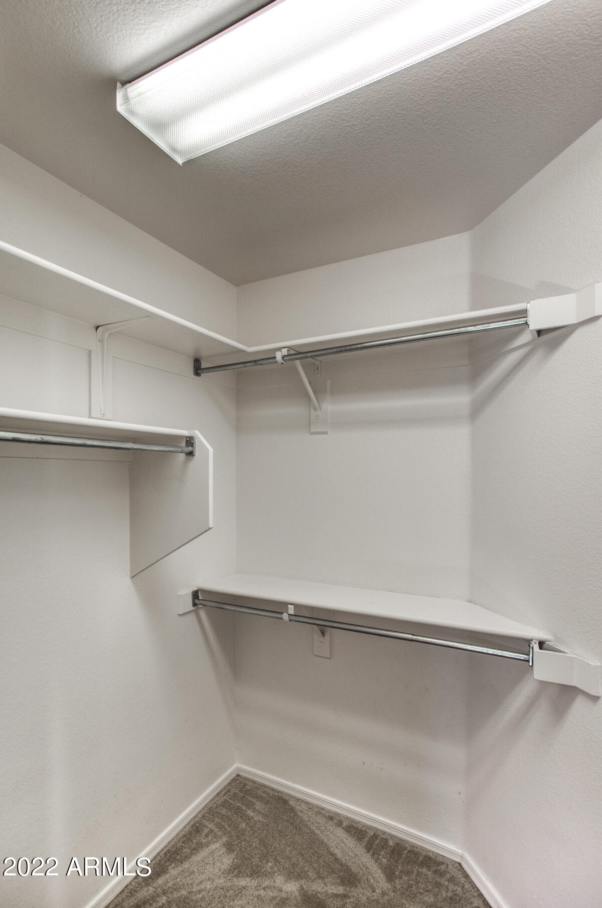 4333 South Rim Court Gilbert, AZ 85297 - Photo 13 of 20 a view of an empty walk in closet