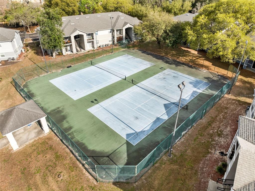 3705 Southwest 27th Street, Unit 615 Gainesville, FL 32608 - Photo 19 of 27 a view of a house with a yard