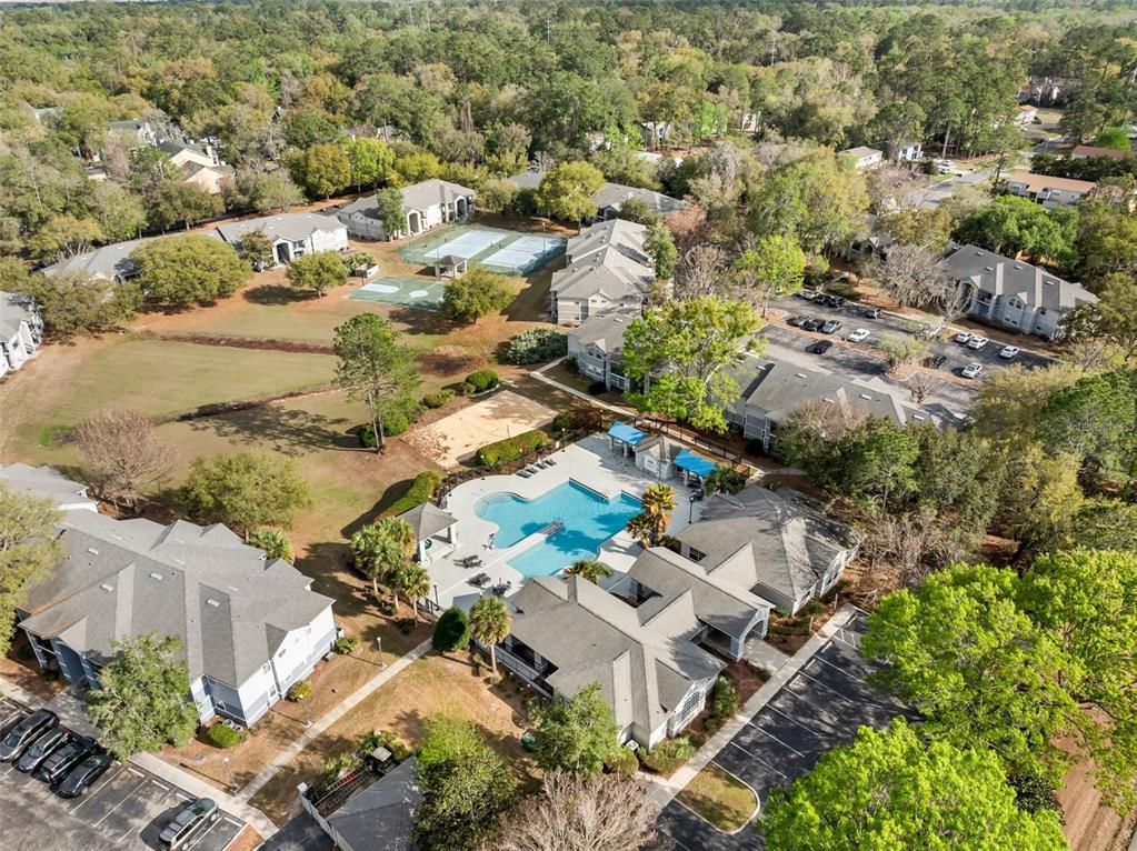 3705 Southwest 27th Street, Unit 615 Gainesville, FL 32608 - Photo 21 of 27 an aerial view of residential house with parking space
