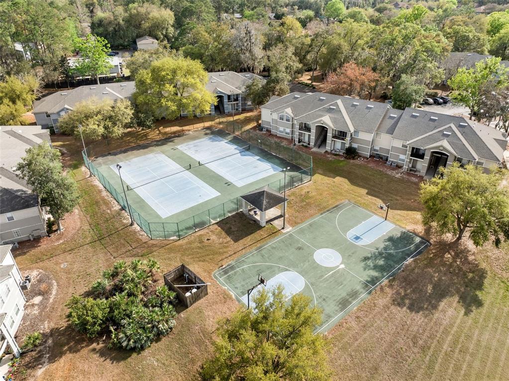 3705 Southwest 27th Street, Unit 615 Gainesville, FL 32608 - Photo 22 of 27 an aerial view of a house with a garden
