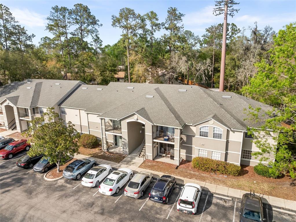 3705 Southwest 27th Street, Unit 615 Gainesville, FL 32608 - Photo 26 of 27 a aerial view of a house with garden