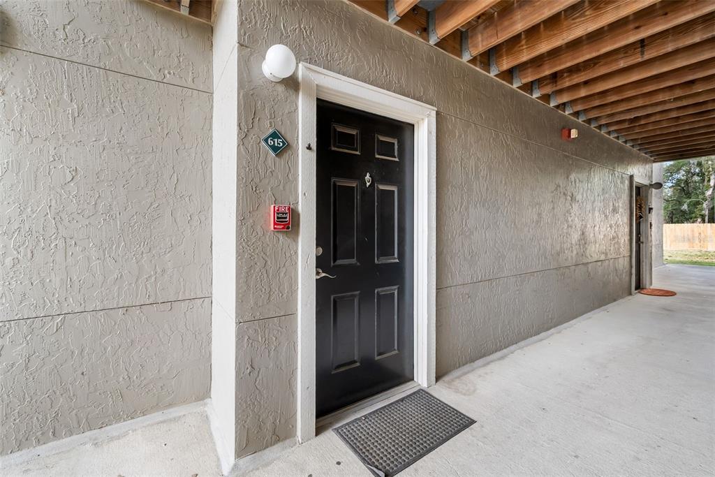 3705 Southwest 27th Street, Unit 615 Gainesville, FL 32608 - Photo 4 of 27 a view of a wooden door