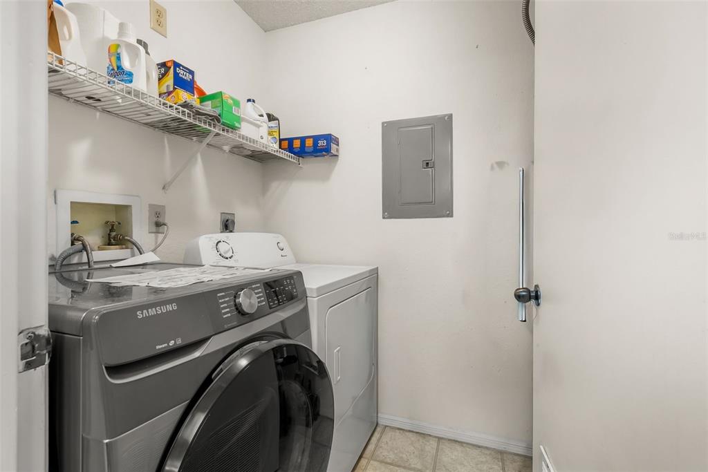 3705 Southwest 27th Street, Unit 615 Gainesville, FL 32608 - Photo 10 of 27 a utility room with dryer and washer