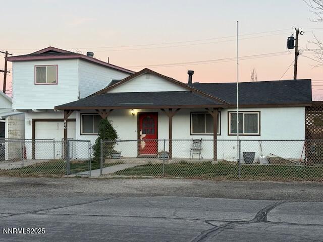 950 H Street Hawthorne, NV 89415 - Photo 2 of 26 a front view of a house with a road