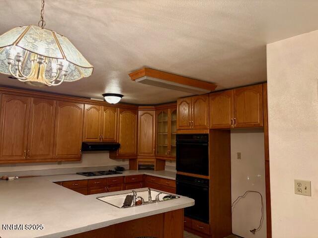 950 H Street Hawthorne, NV 89415 - Photo 22 of 26 a kitchen with a sink a stove and a refrigerator