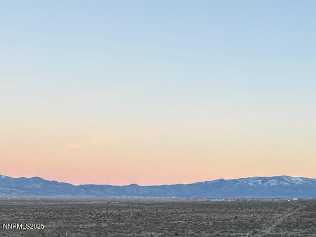 950 H Street Hawthorne, NV 89415 - Photo 3 of 26 a view of mountain with sunset in background