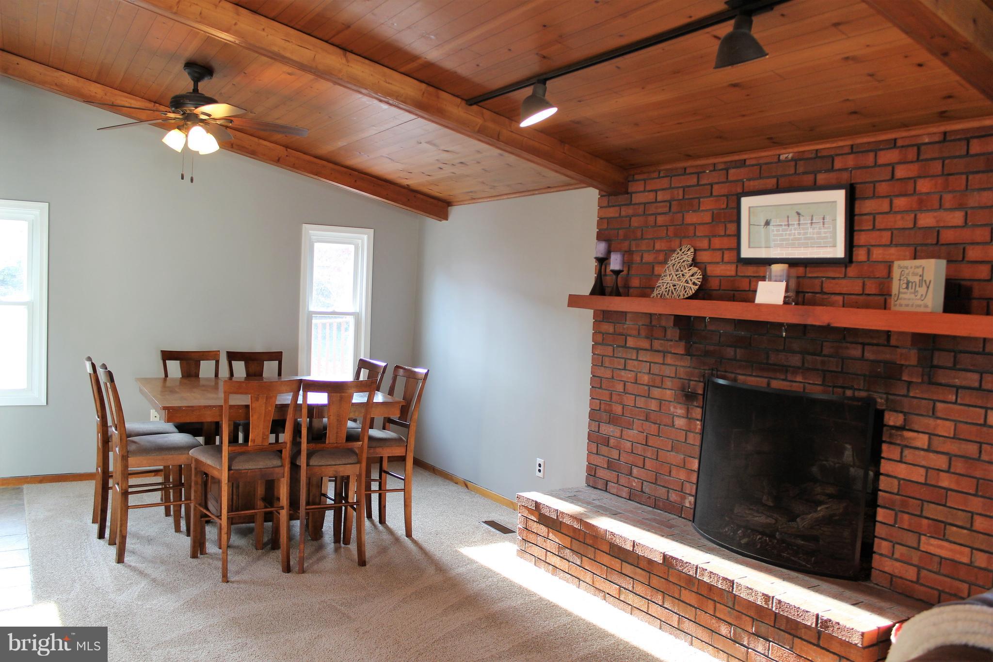 222 Dale Road Pasadena, MD 21122 - Photo 12 of 28 42x 13 family room w/ wood ceilings and new carpet