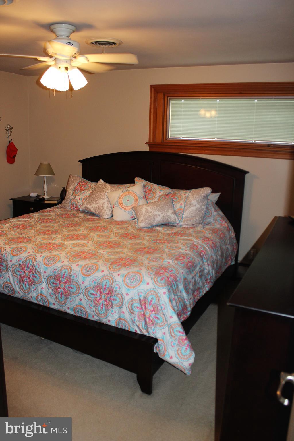 222 Dale Road Pasadena, MD 21122 - Photo 16 of 28 Master bedroom w/ Pella windows and fan.