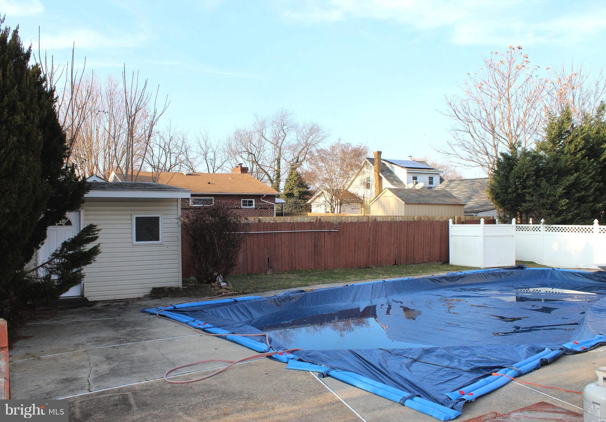 222 Dale Road Pasadena, MD 21122 - Photo 24 of 28 Fenced rear yard w/in-ground pool.