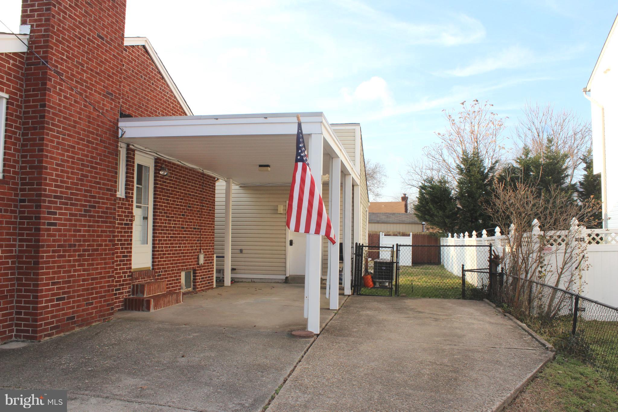 222 Dale Road Pasadena, MD 21122 - Photo 28 of 28 Covered carport and large driveway.