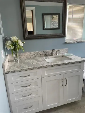 a dinning room with wooden floor