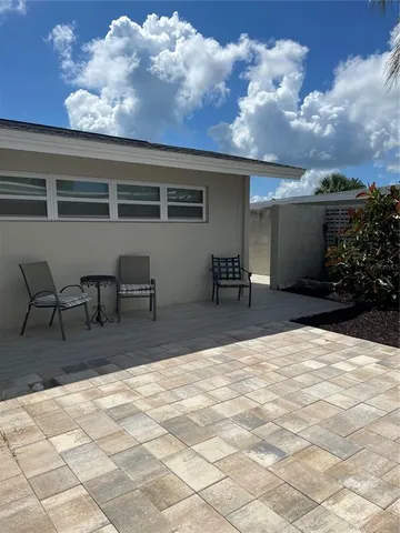 a view of house with patio