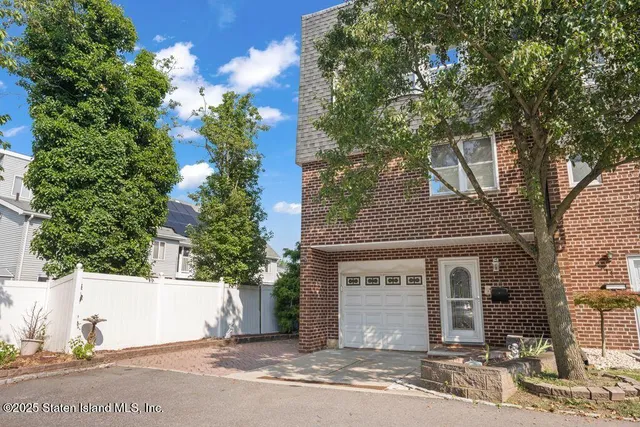 front view of a house with a street