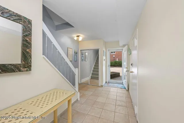 a view of an entryway with staircase