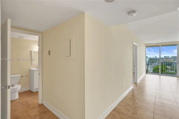 a view of an empty room and window
