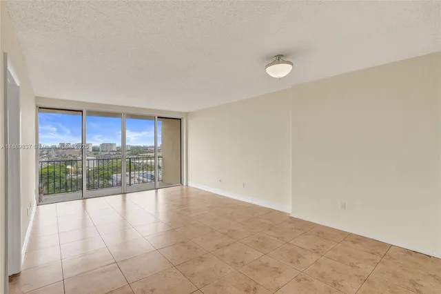 a view of an empty room and window