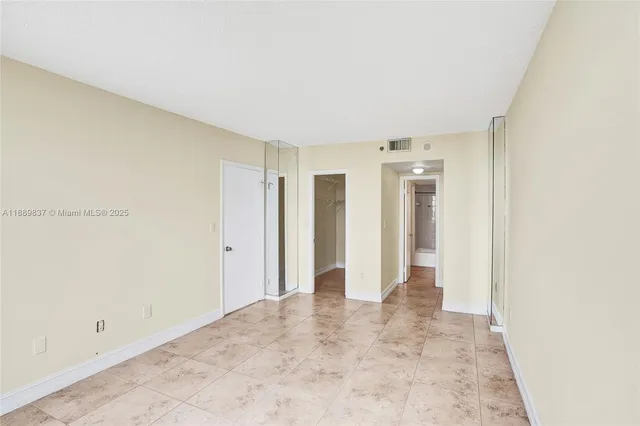 a kitchen with stainless steel appliances granite countertop a sink and a microwave