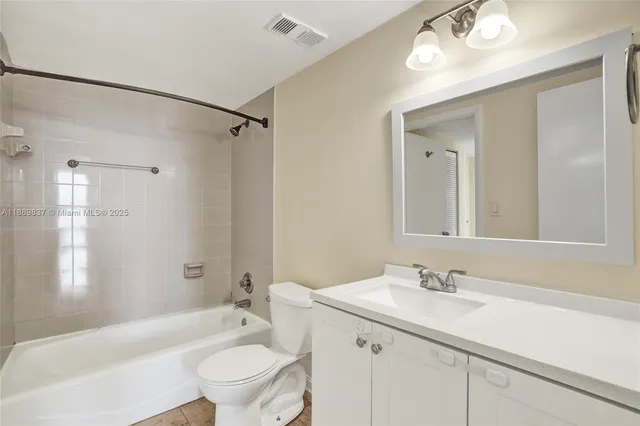 a view of storage room with washer and dryer