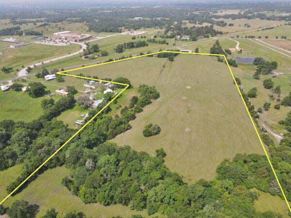 10 Fm 149 Road West Anderson, TX 77830 - Photo 9 of 17 an aerial view of residential houses with outdoor space