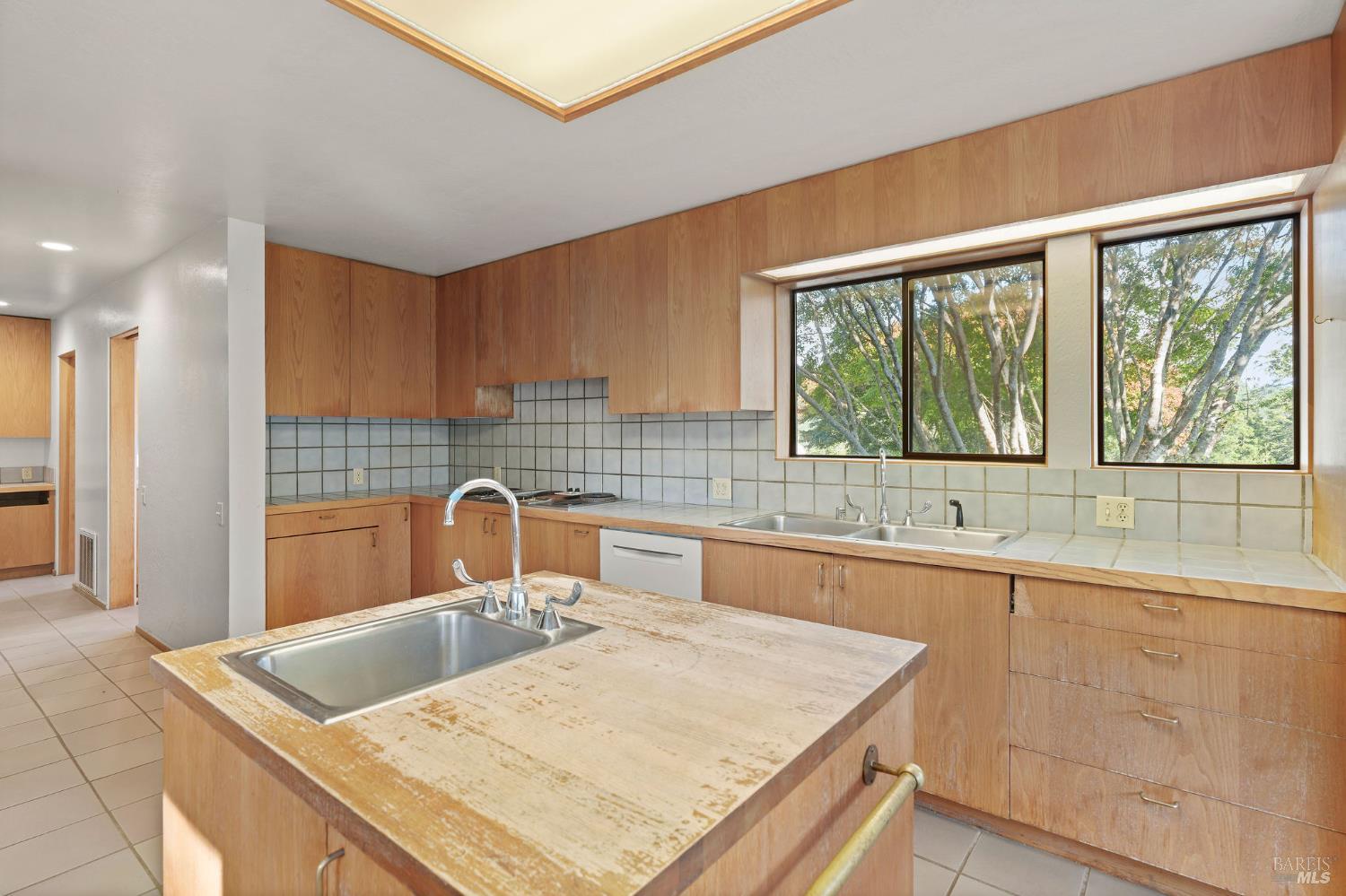 36029 Timber Ridge Road The Sea Ranch, CA 95497 - Photo 36 of 59 a kitchen with a sink and a large window