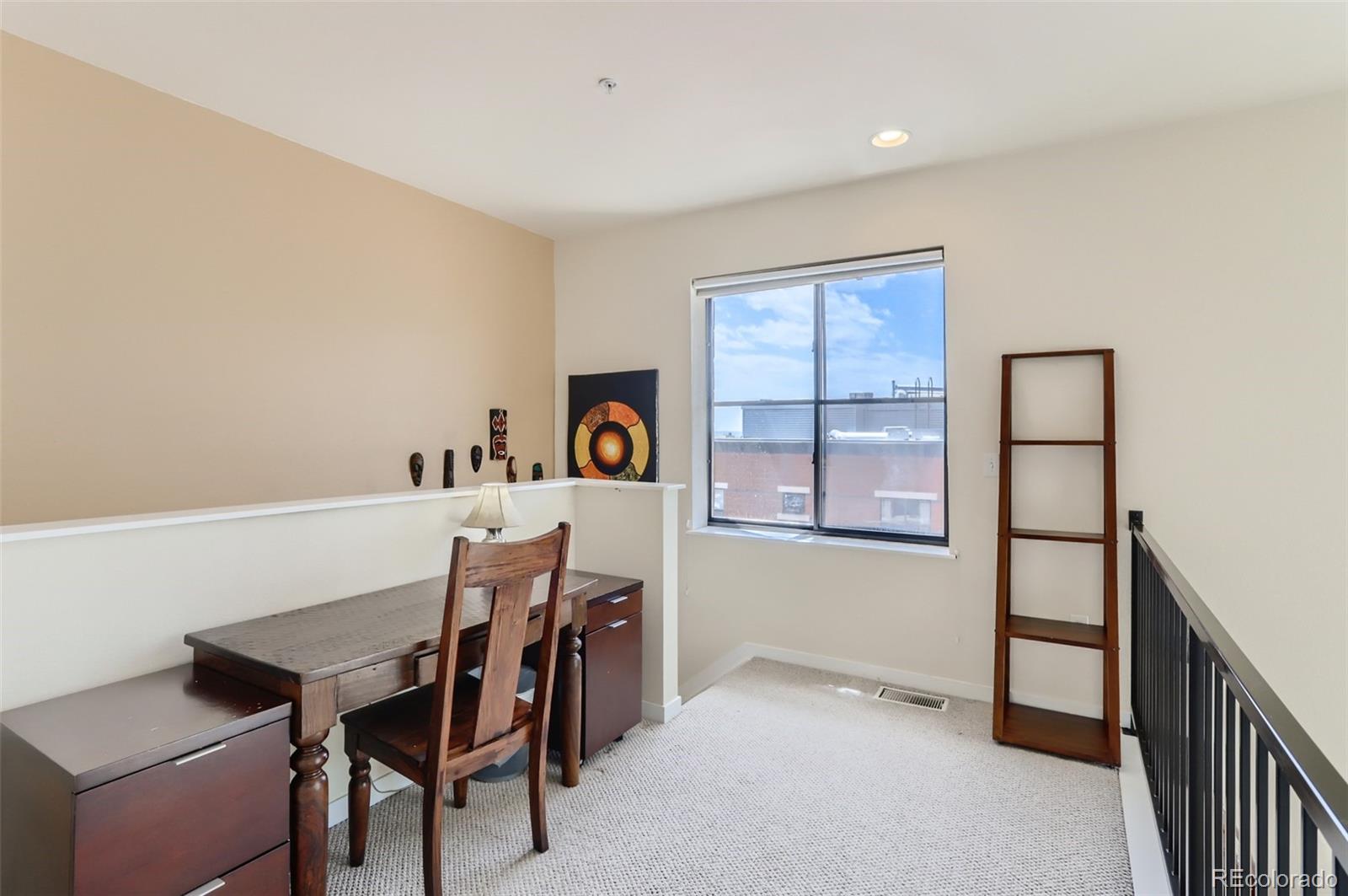 4580 Broadway, Unit 223 Boulder, CO 80304 - Photo 15 of 28 a view of a dining room with furniture and window
