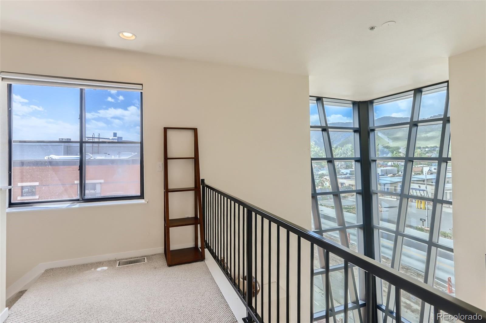 4580 Broadway, Unit 223 Boulder, CO 80304 - Photo 16 of 28 a view of an empty room with a window