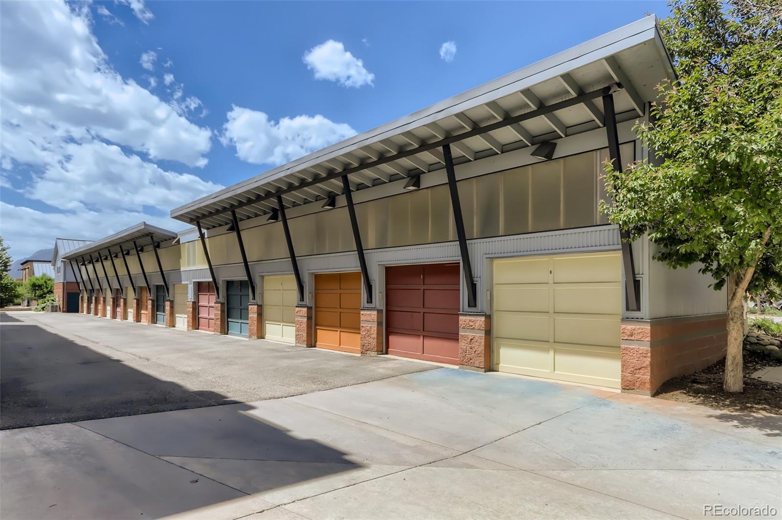 4580 Broadway, Unit 223 Boulder, CO 80304 - Photo 24 of 28 a view of a house with a garage