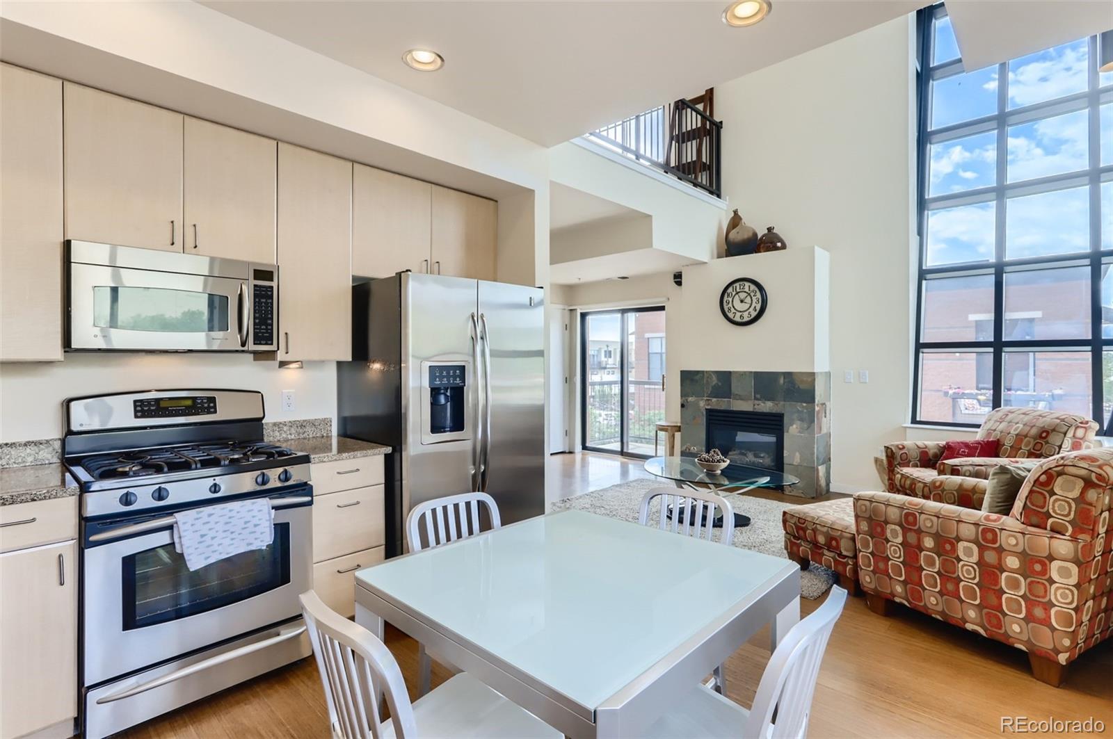 4580 Broadway, Unit 223 Boulder, CO 80304 - Photo 7 of 28 a living room with furniture and a fireplace