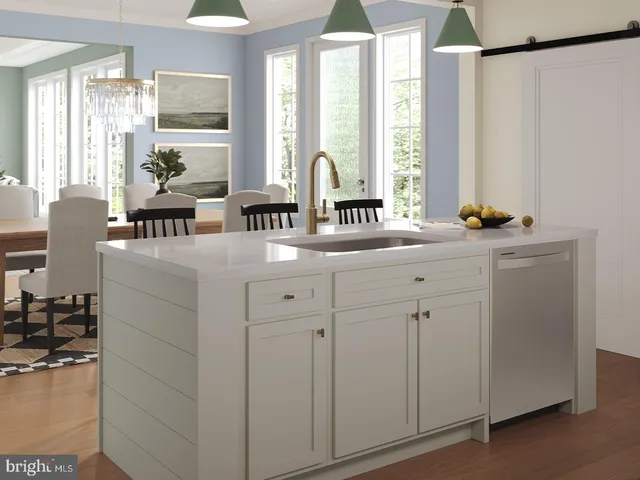 a kitchen with sink cabinets and window