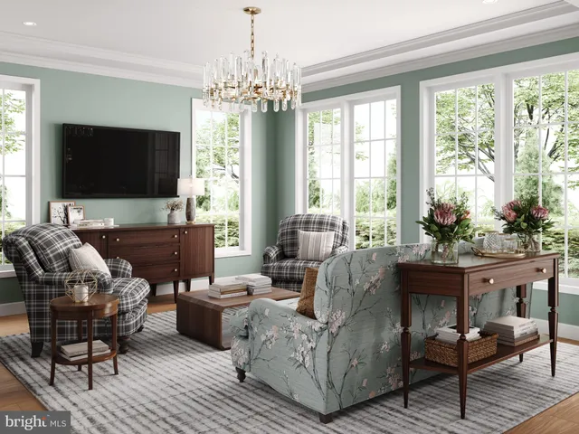 a living room with furniture a flat screen tv and a large window