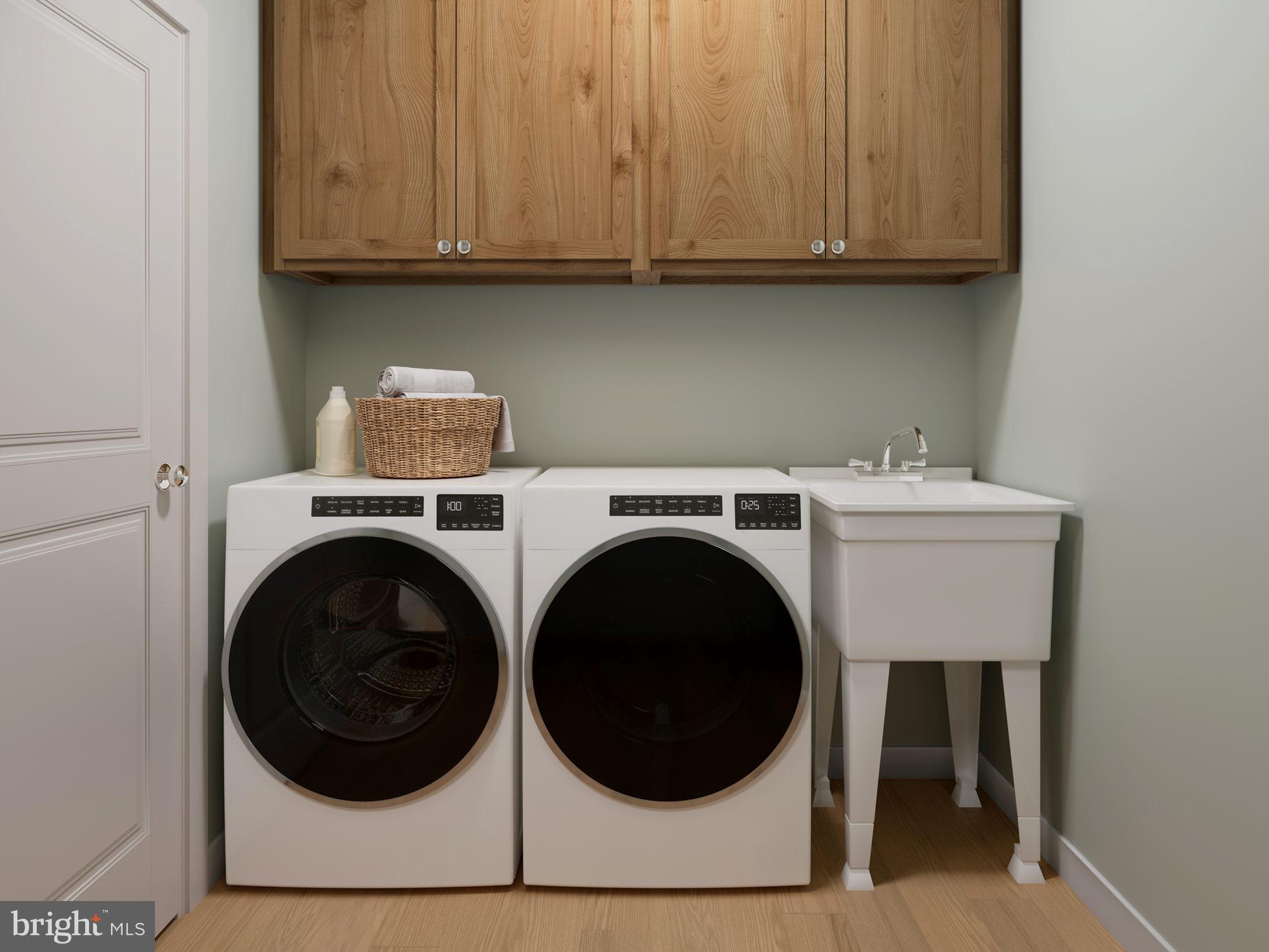 104 Merchant Avenue, Unit ELGIN Mount Joy, PA 17552 - Photo 22 of 34 a utility room with dryer and washer