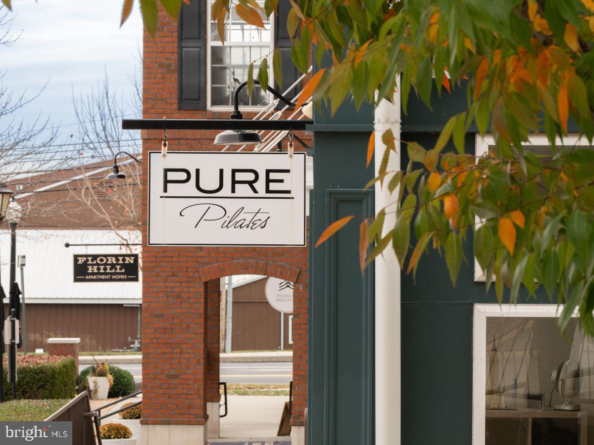 104 Merchant Avenue, Unit ELGIN Mount Joy, PA 17552 - Photo 30 of 34 a sign that is on a pole