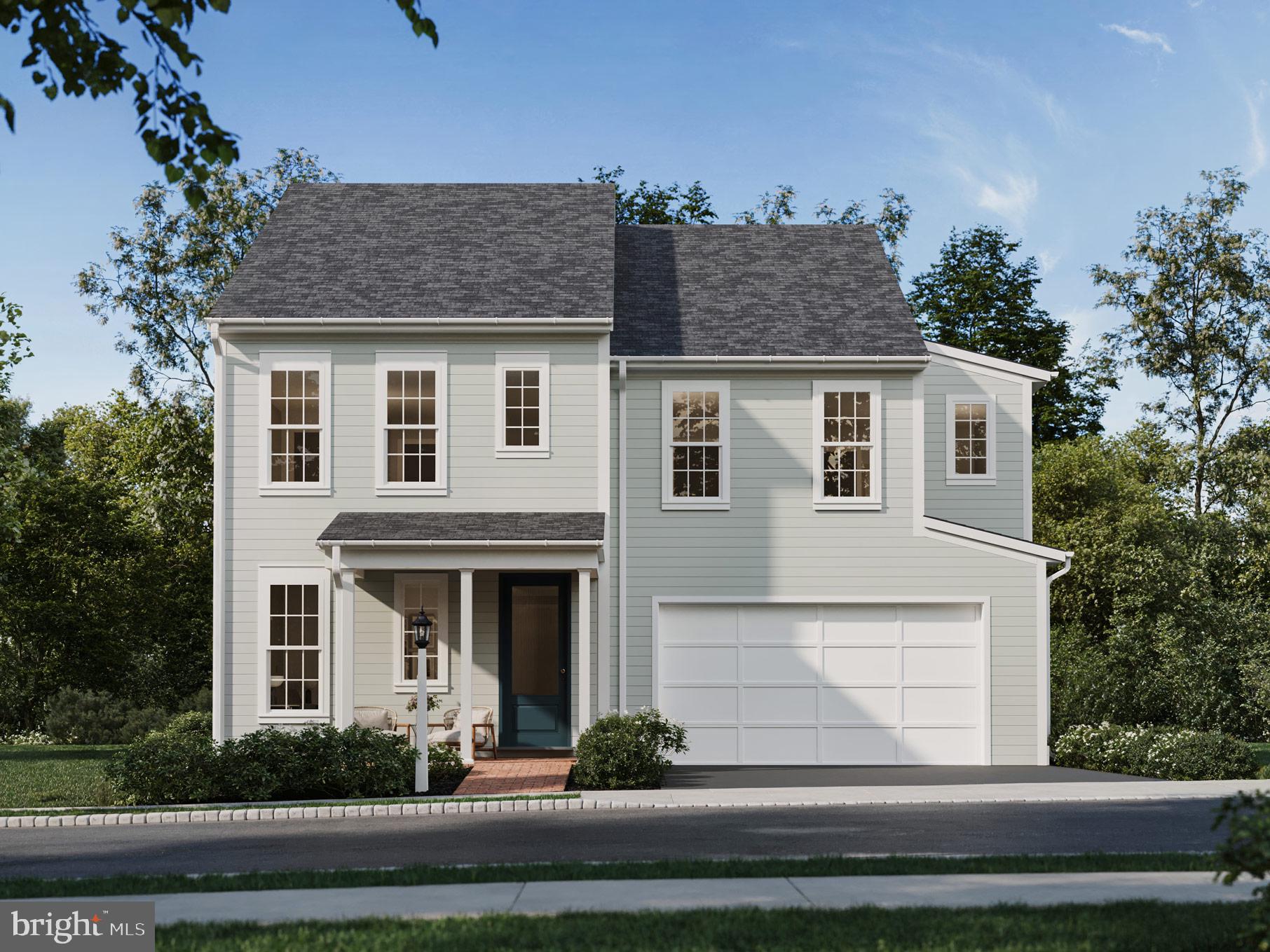 104 Merchant Avenue, Unit ELGIN Mount Joy, PA 17552 - Photo 4 of 34 a front view of a house with a yard