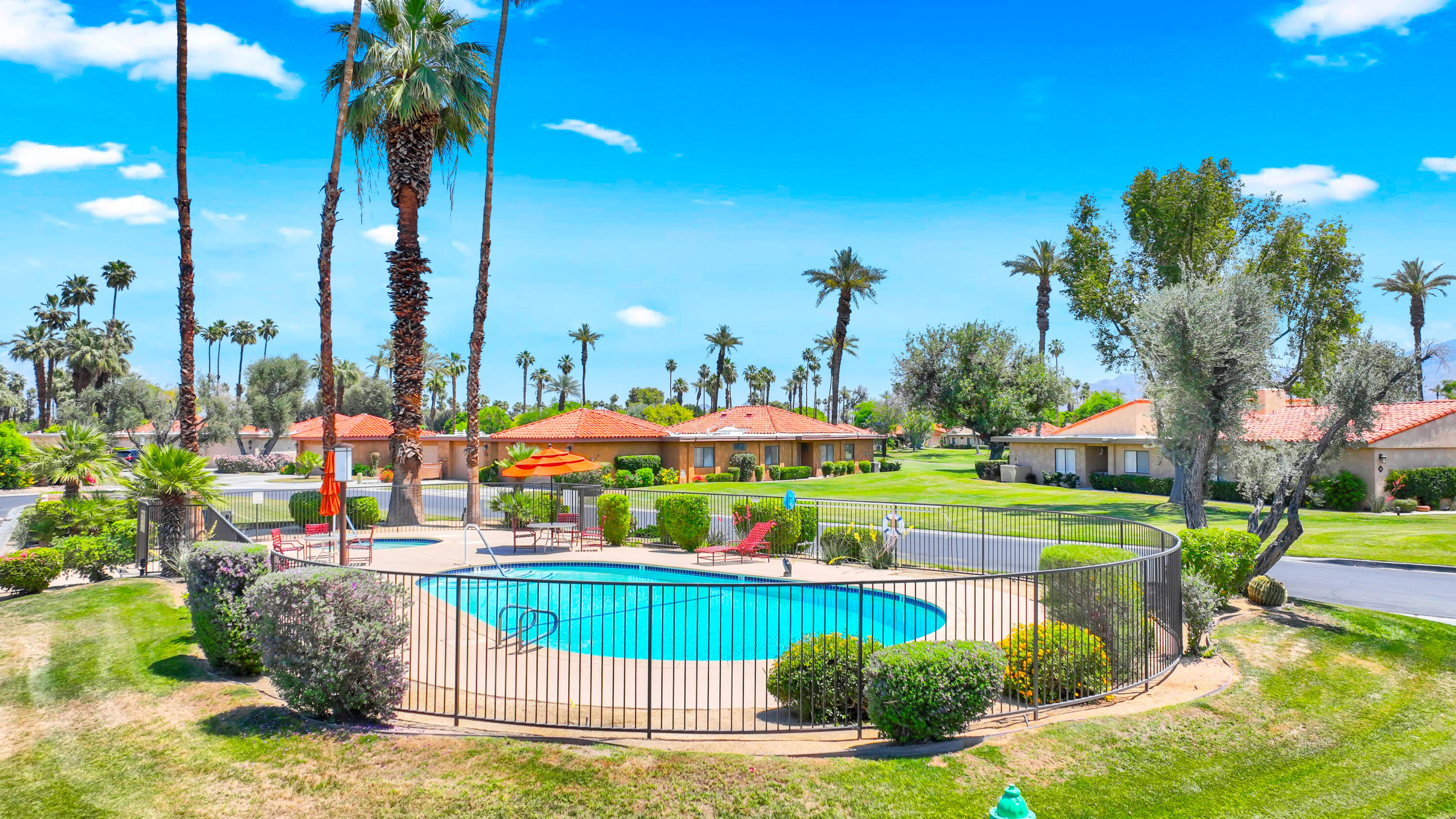 23 Haig Drive Rancho Mirage, CA 92270 - Photo 27 of 49 a view of a swimming pool with a patio
