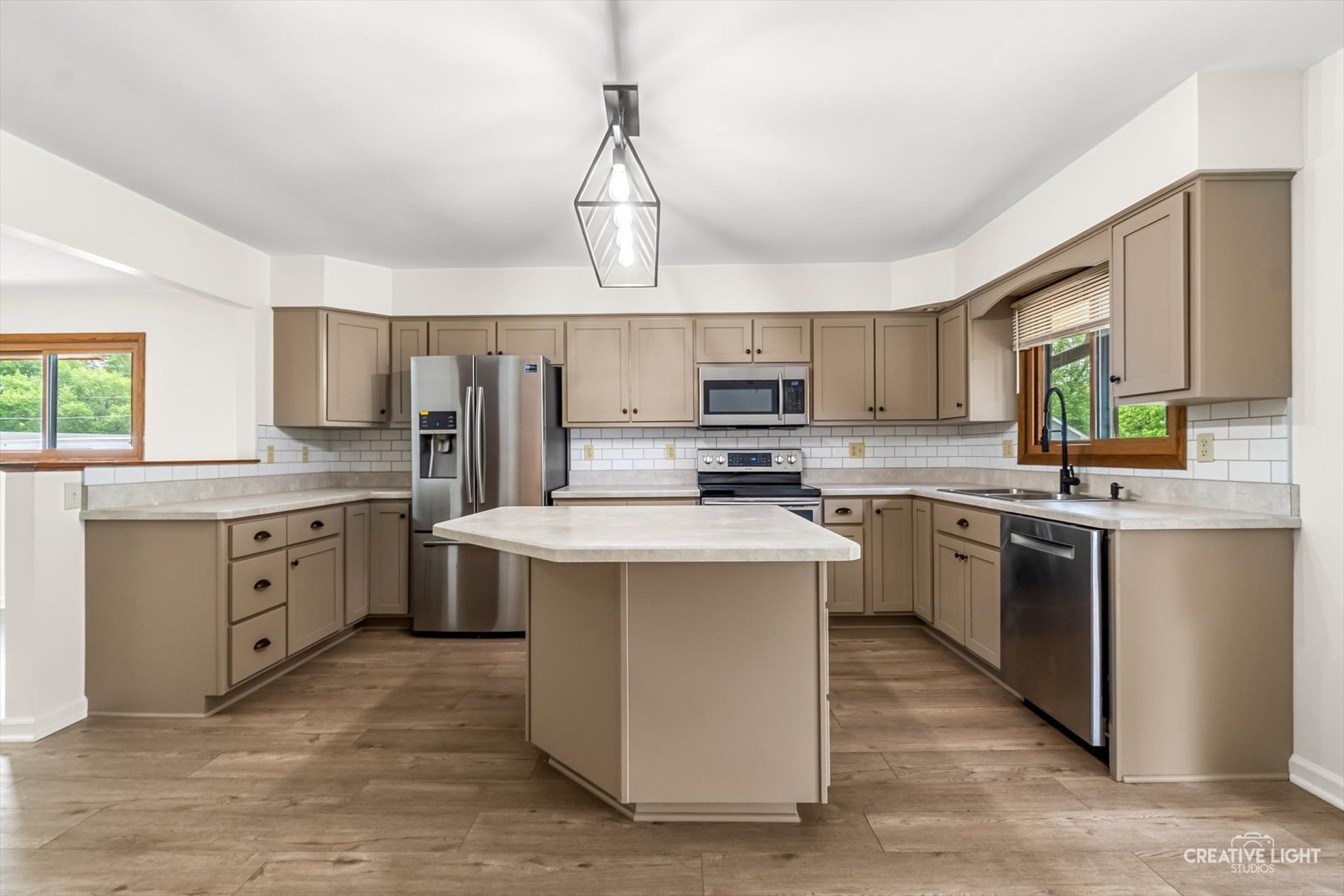 1483 Nova Road Sandwich, IL 60548 - Photo 5 of 29 a kitchen that has a lot of cabinets in it and appliances