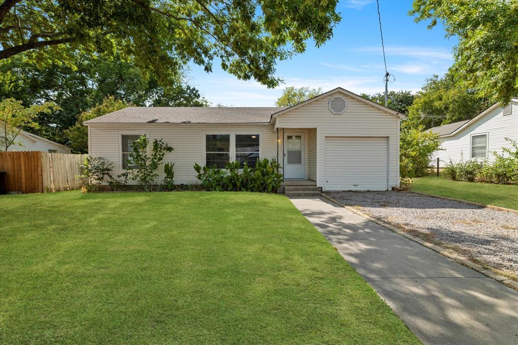 2411 Denison Street Denton, TX 76201 - Photo 2 of 15 a front view of house with yard and green space