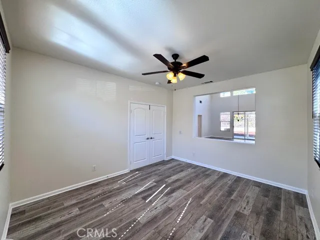 a view of an entryway with wooden floor